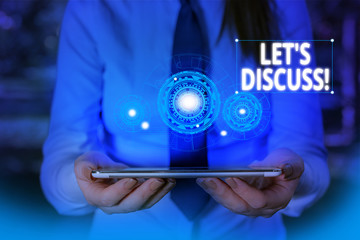 Conceptual hand writing showing Let S Discuss. Concept meaning asking someone to talk about something with demonstrating or showing Woman wear work suit presenting presentation smart device