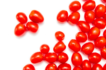 Red cherry tomatoes on a white background