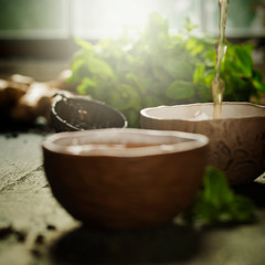 Tea composition on wooden table, close up