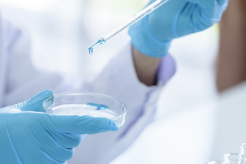 The scientist have test and researching in laboratory.