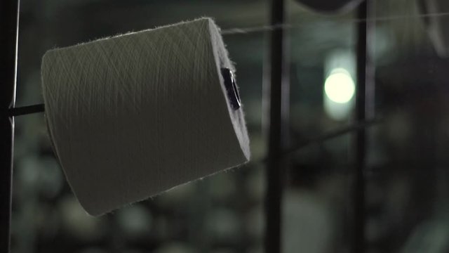 Closeup Of A Spool Of Cotton Thread Used On A Spinning Machine.