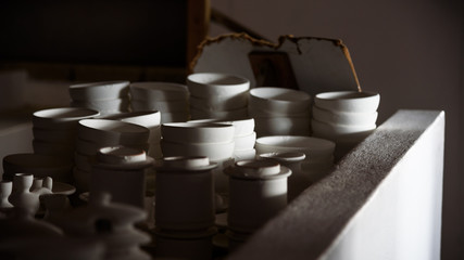 crafted pottery in portugal, still life of hand made pottery and ceramic bowls - 287157959