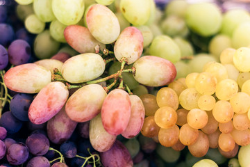 White and blue grapes background texture, autumn harvest.