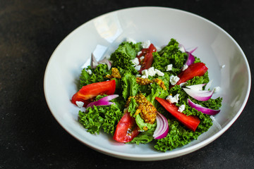 Healthy salad, tomato, lettuce leaf salad (mix micro greens, juicy snack) leaves mix. food background