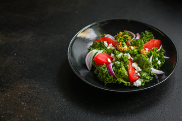 Healthy salad, tomato, lettuce leaf salad (mix micro greens, juicy snack) leaves mix. food background