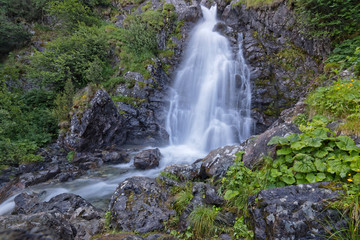 The well-known waterfall of L'Oursiere in Chamrousse massif, near grenoble
