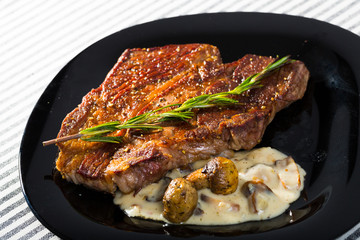 Image of beef entrecote with mushroom sauce