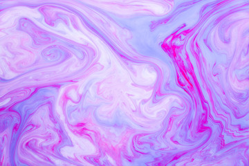 Abstract colored background, fluid design. Stains of paint on the water. Ebru art, marbled paper.