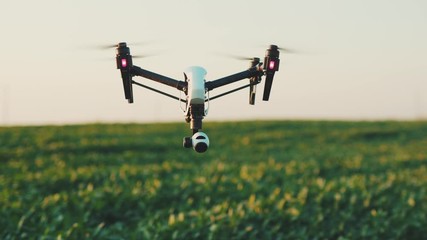 Close up smart agriculture drone flying in sky rural aerial helicopter agros copter farm farming field industry landscape meadow nature plant professional vehicle harvest innovation slow motion