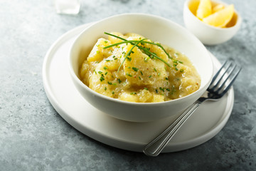 Traditional potato salad with herbs