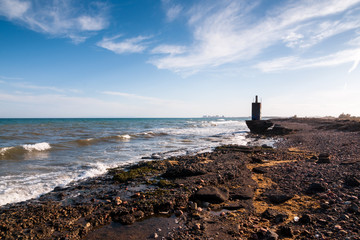 Fototapeta na wymiar Geodetic point on the beach of Puçol.