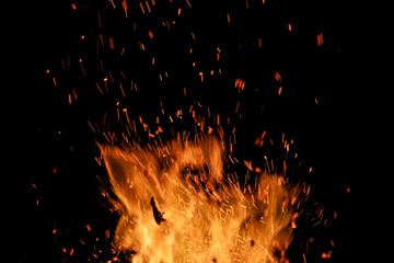 flame of fire with sparks on a black background