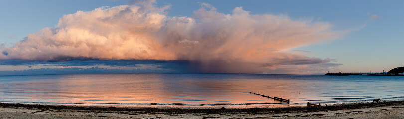 Fototapeta na wymiar Storm clouds at sunset, Douglas bay, Isle of Man, British Isles