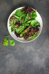 Healthy salad, leaves mix salad (mix micro greens, juicy snack). food background - Image