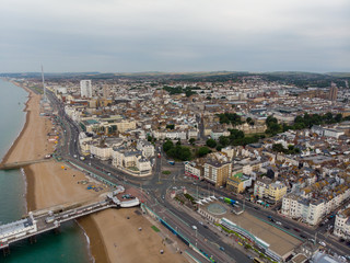 Obraz premium Aerial photo of the Brighton beach and coastal area located in the south coast of England UK that is part of the City of Brighton and Hove, taken on a bright sunny day