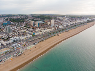 Fototapeta premium Aerial photo of the Brighton beach and coastal area located in the south coast of England UK that is part of the City of Brighton and Hove, taken on a bright sunny day