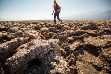 A hiker in Death Valley National Park, Geology, sand.