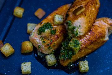 Grilled salmon with croutons.
