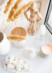 White real home decor, ceramic interior details with vases and candles