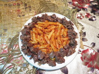 Fingers Pasta With Sauce And Chicken Liver Cooked With Onions