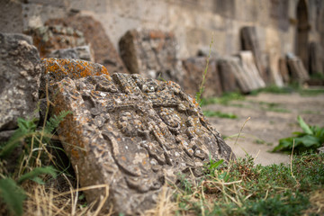 Broken Armenian cross-stone, in Tatev monastery. Beautiful view. Tatev monastery , Armenia. ( khachkar ).