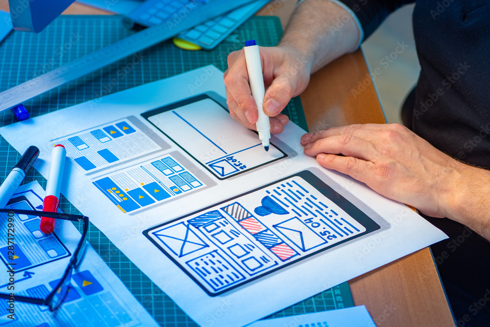 Poster user interface design.man comes up with the application. the designer resets the program interface. 
