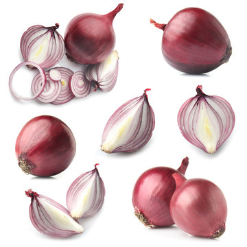Set with raw onion on white background