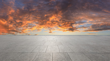 Fototapeta na wymiar Wide square floor and beautiful sky clouds at sunset