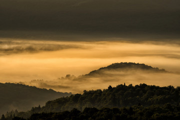 Beautiful misty sunrise in the mountains. Bieszczady Mountains. Poland.