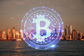 Double exposure of crypto currency theme hologram drawing and city veiw background. Concept of...