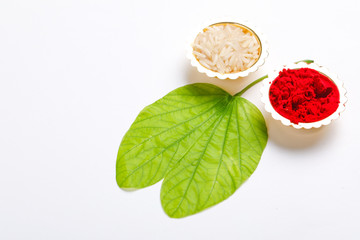 Happy Dussehra greeting card , green leaf, Rice and kumkum