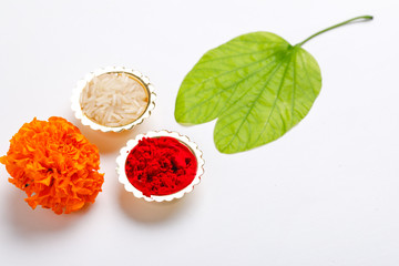 Happy Dussehra greeting card , green leaf, Rice and kumkum