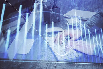 Double exposure of financial graph with man works in office on background. Concept of analysis.