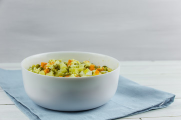 Russian salad Olivier with potato carrot green peas