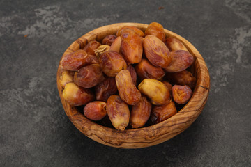 Sweet tasty dry dates in the basket