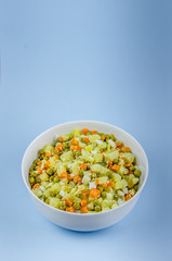 Russian salad Olivier with potato carrot green peas