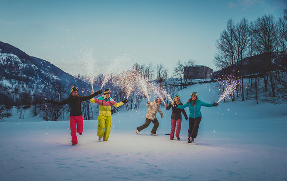 Group Of Snowboarders On Winter Holiday