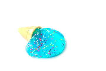 Modern toy for kids called slime. Ice cream made of transparent blue slime. Mucus isolated on a white background. 