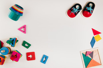 Colourful toys and shapes on a white background