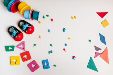 Colourful toys and shapes on a white background