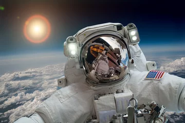 Deurstickers Astronaut in de ruimte © Andrei Armiagov