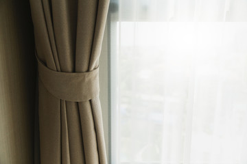 soft brown curtain with morning light from window bedroom background