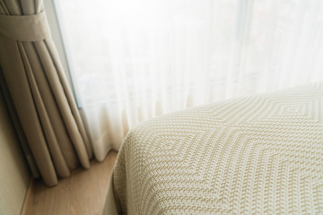 soft brown curtain with morning light from window bedroom background