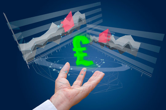 Graphics - Hand of a businessman with 3d figures data number and pund UK currency symbol on a dark background