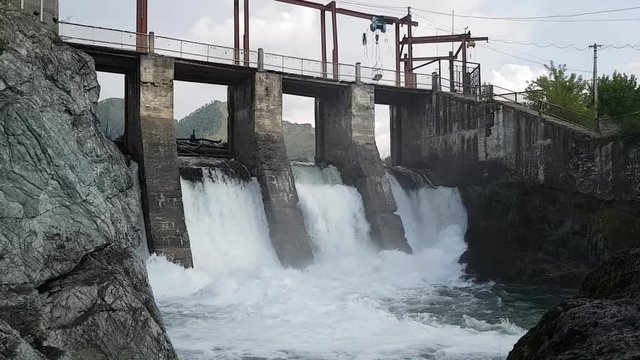 View of the old hydroelectric Chemal in the Altai Republic in Russia. Journey summer Altay