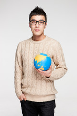 Various images of a man wearing black glasses.