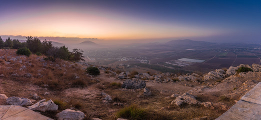 Fototapeta na wymiar Morning view at morning sunrice from Mount Precipice on a nearby valley near Nazareth in Israel