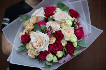 the most beautiful flowers, magnificent bouquets of flowers on the leg in the interior of the restaurant for a festive floristry store or wedding salon for the bride or groom, a bridal bouquet, butane