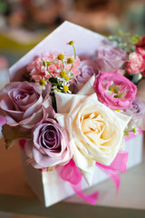 the most beautiful flowers, magnificent bouquets of flowers on the leg in the interior of the restaurant for a festive floristry store or wedding salon for the bride or groom, a bridal bouquet, butane