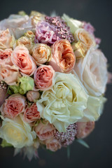 the most beautiful flowers, magnificent bouquets of flowers on the leg in the interior of the restaurant for a festive floristry store or wedding salon for the bride or groom, a bridal bouquet, butane
